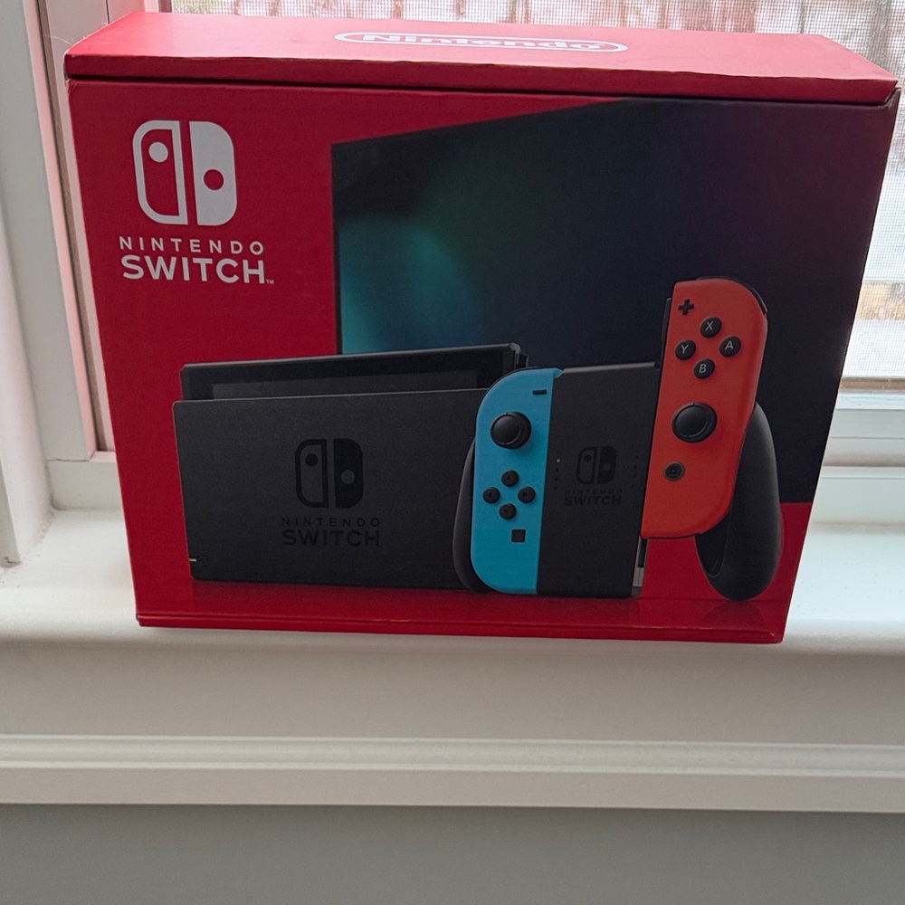 Nintendo Switch Console with Red and Blue Controllers Brand New